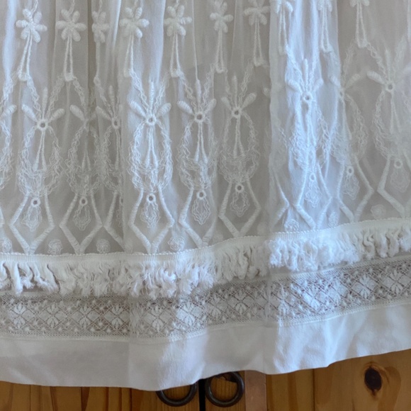 Sheer white embroidered top with fringe. - Picture 4 of 4